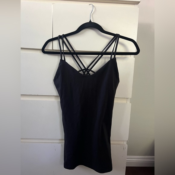 Lululemon black top, criss-cross back size 6. Just too small for me now. Used . - Picture 2 of 6